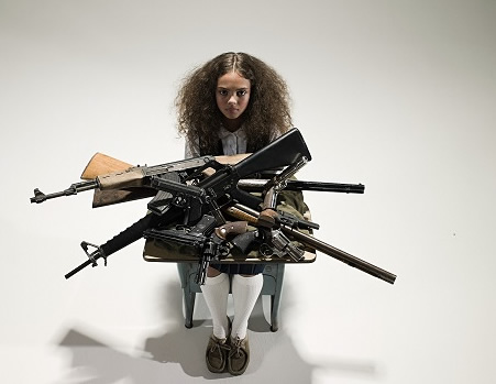 girl in chair with ak15